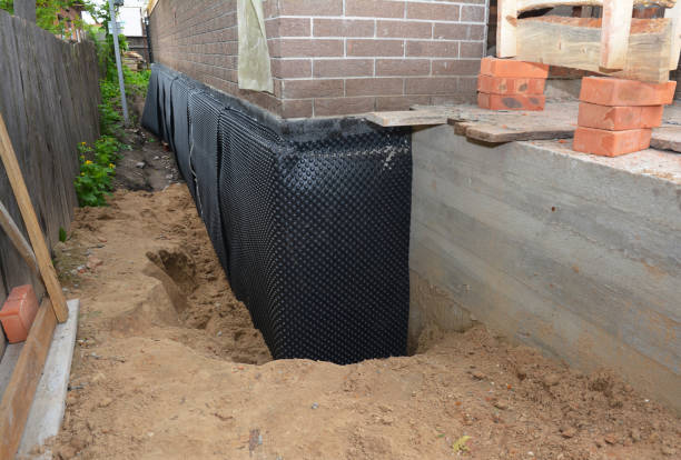 SJ Waterproofing Pros technician performing targeted Exterior Waterproofing assessment in Mount Sterling, IL